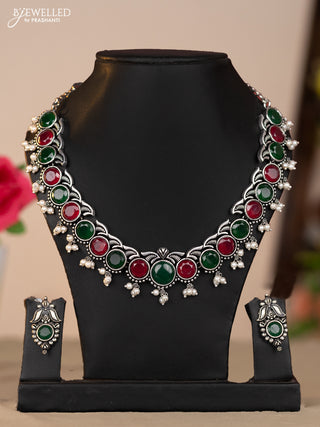 Oxidised necklace in red and green stones