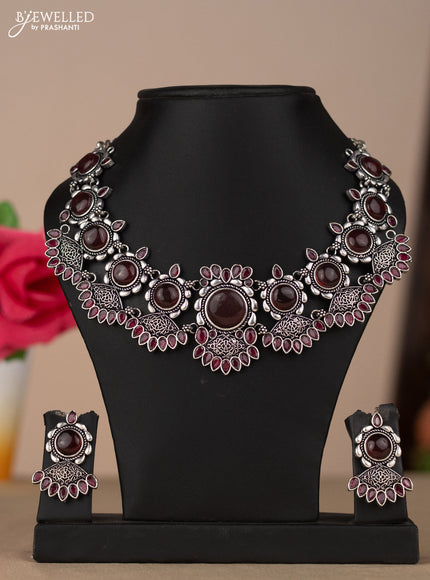 Oxidised necklace in red stones