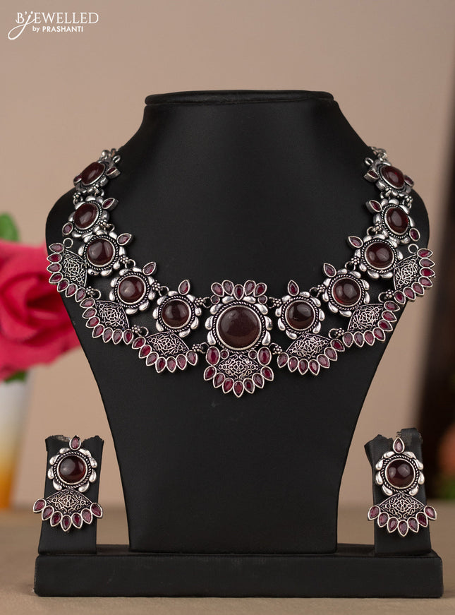 Oxidised necklace in red stones