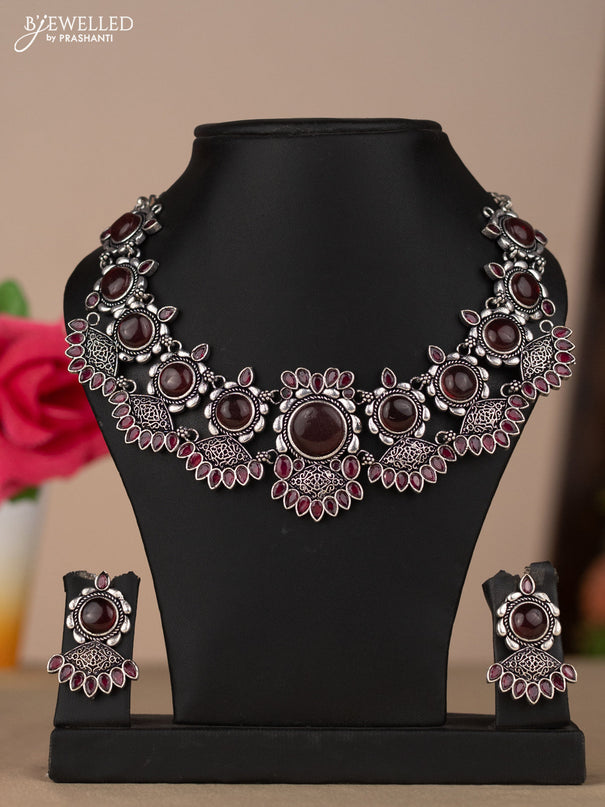 Oxidised necklace in red stones