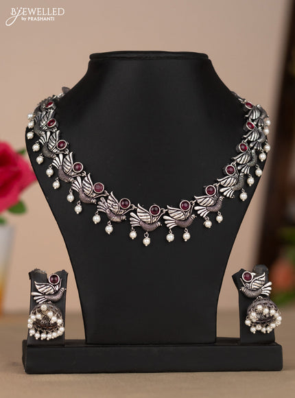 Oxidised necklace bird design in red color stones