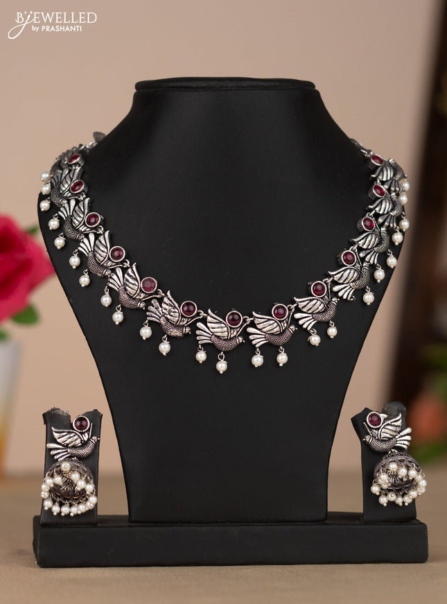 Oxidised necklace bird design in red color stones