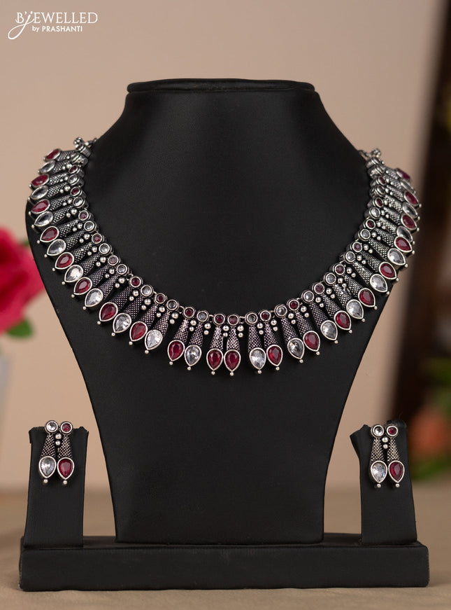 Oxidised necklace in red and white stones