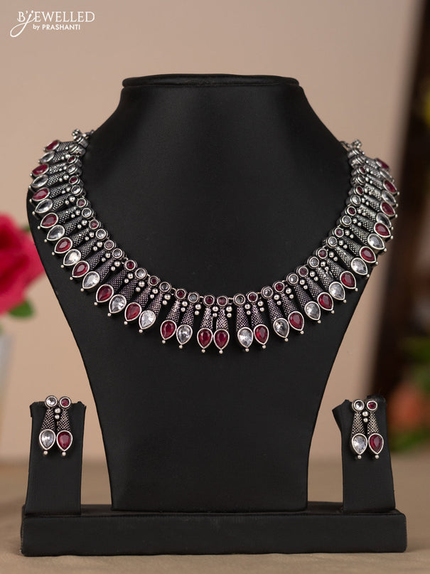 Oxidised necklace in red and white stones