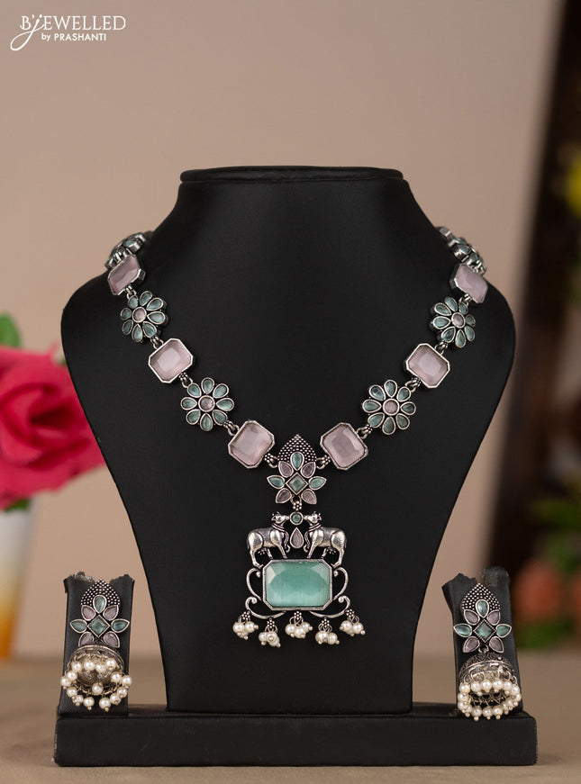 Oxidised necklace with floral design in pastel color stones