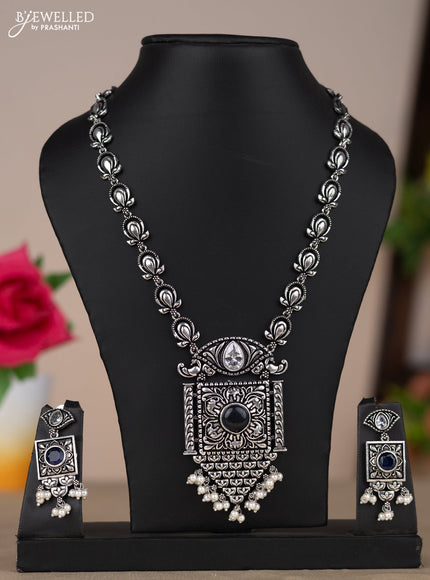 Oxidised necklace with floral design in navy blue stones