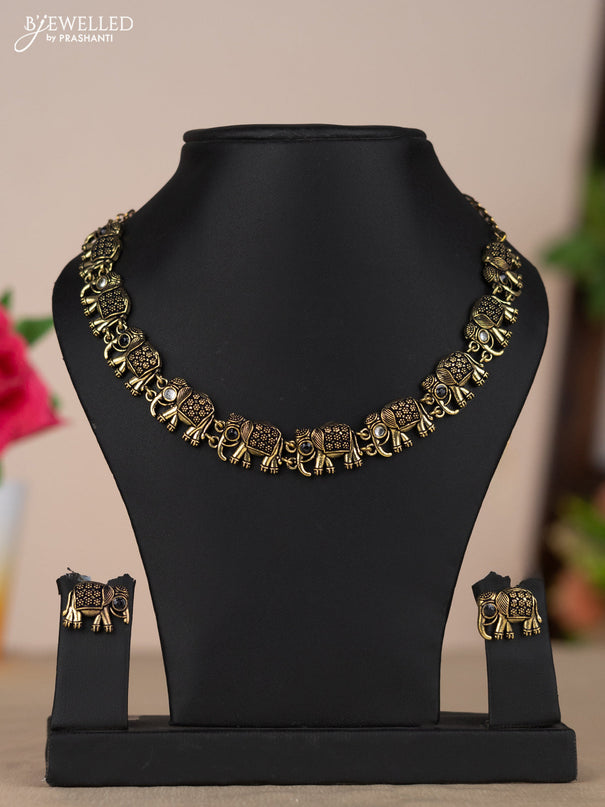 Oxidised necklace with elephant design and white & black stones in gold finish
