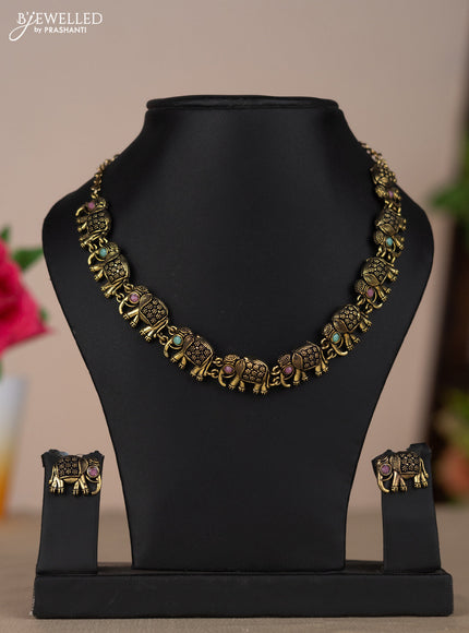 Oxidised necklace with elephant design and multicolor pastel stones in gold finish