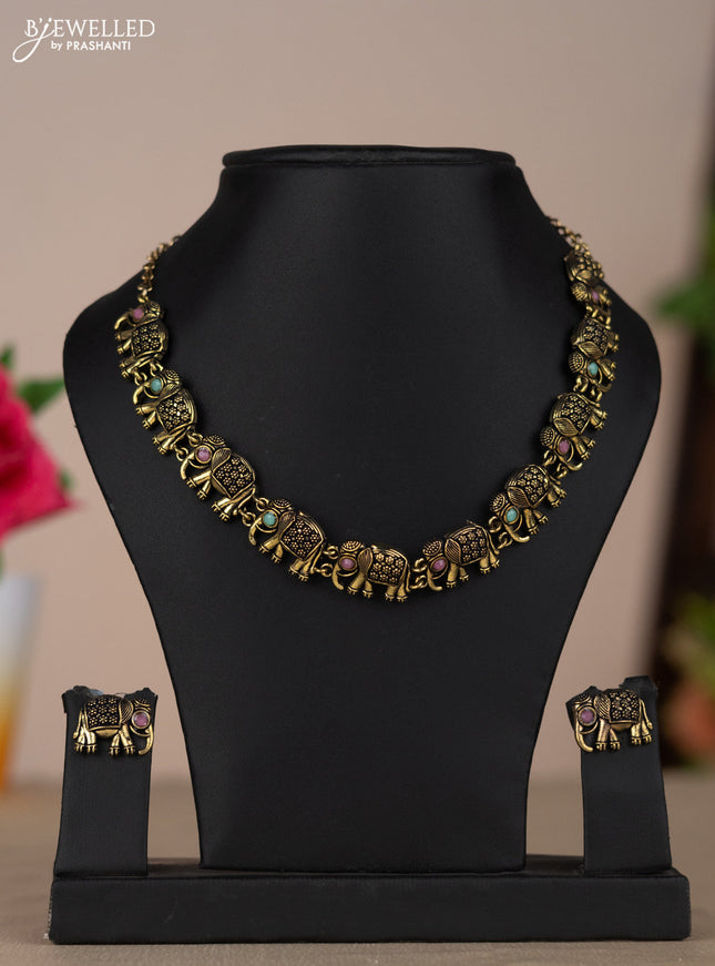 Oxidised necklace with elephant design and multicolor pastel stones in gold finish