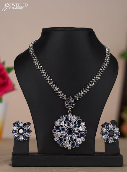 Oxidised necklace with floral design in multicolor blue and white stones