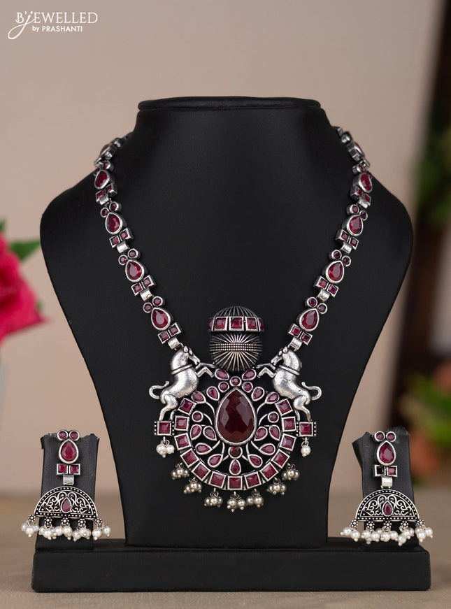 Oxidised necklace with horse design in red stones