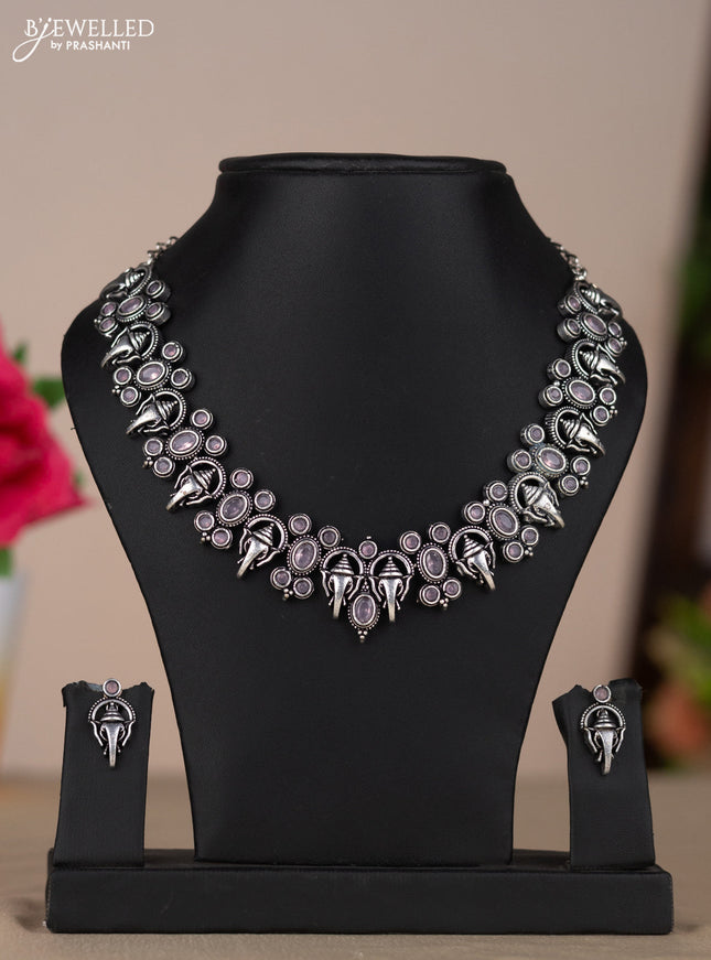 Oxidised necklace with ganesha design in pastel pink stones