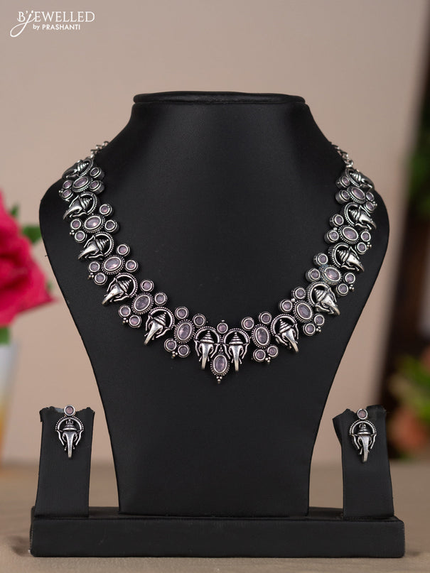 Oxidised necklace with ganesha design in pastel pink stones