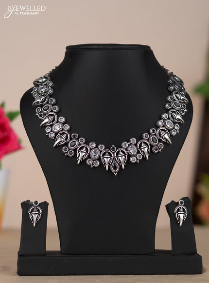 Oxidised necklace with ganesha design in black & white stones