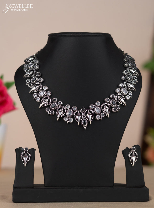 Oxidised necklace with ganesha design in black & white stones
