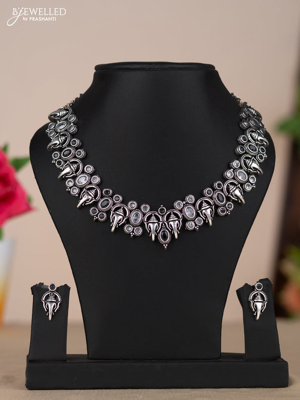 Oxidised necklace with ganesha design in black & white stones
