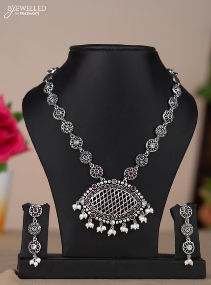Oxidised necklace with floral design in red & white stones