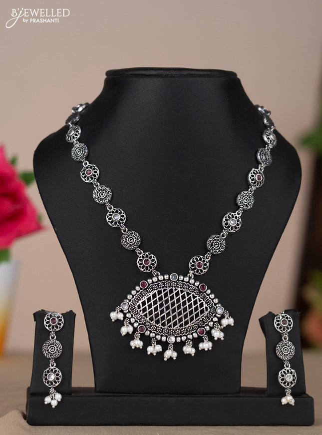 Oxidised necklace with floral design in red & white stones