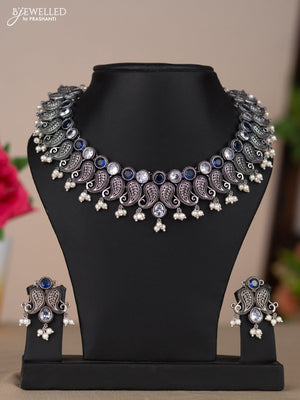 Oxidised necklace with mango design in blue & white stones