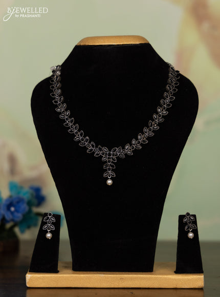 Oxidised necklace leaf design with black stones and pearl hanging