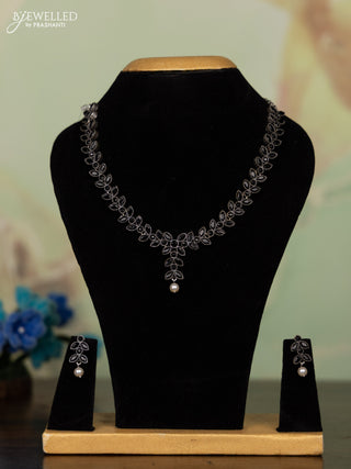 Oxidised necklace leaf design with black stones and pearl hanging