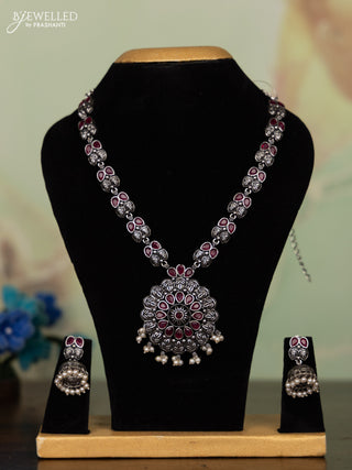 Oxidised necklace with ruby stones and pearl hangings