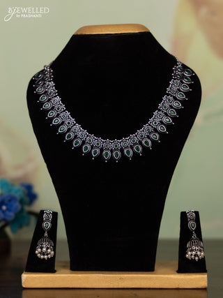 Oxidised necklace with emerald stones