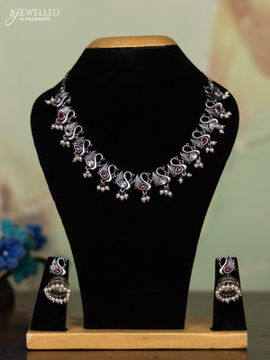 Oxidised necklace peacock design with ruby & white stones and pearl hangings
