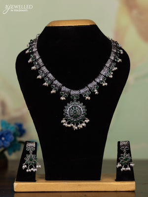 Oxidised necklace with emerald stones and pearl hangings