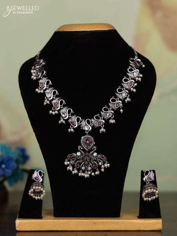 Oxidised necklace peacock design with ruby & white stones and pearl hangings