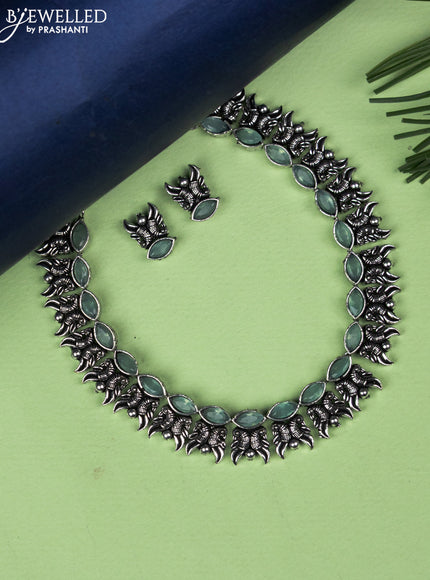 Oxidised necklace with mint green stones