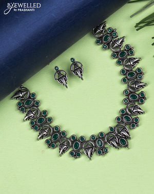 Oxidised necklace ganesha design with emerald stones