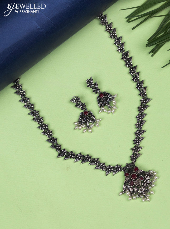 Oxidised necklace floral design with ruby stones and pearl hangings