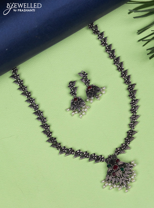 Oxidised necklace floral design with emerald & ruby stones and pearl hangings