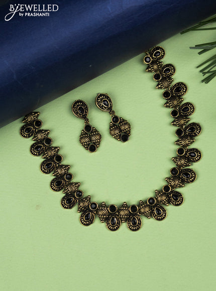 Oxidised necklace with black stones in gold finish