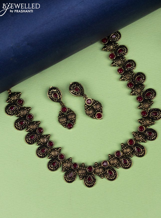 Oxidised necklace with ruby stones in gold finish