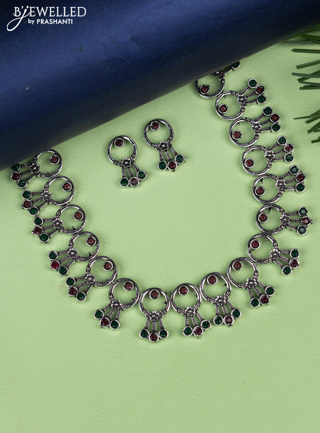 Oxidised necklace with emerald and ruby stones