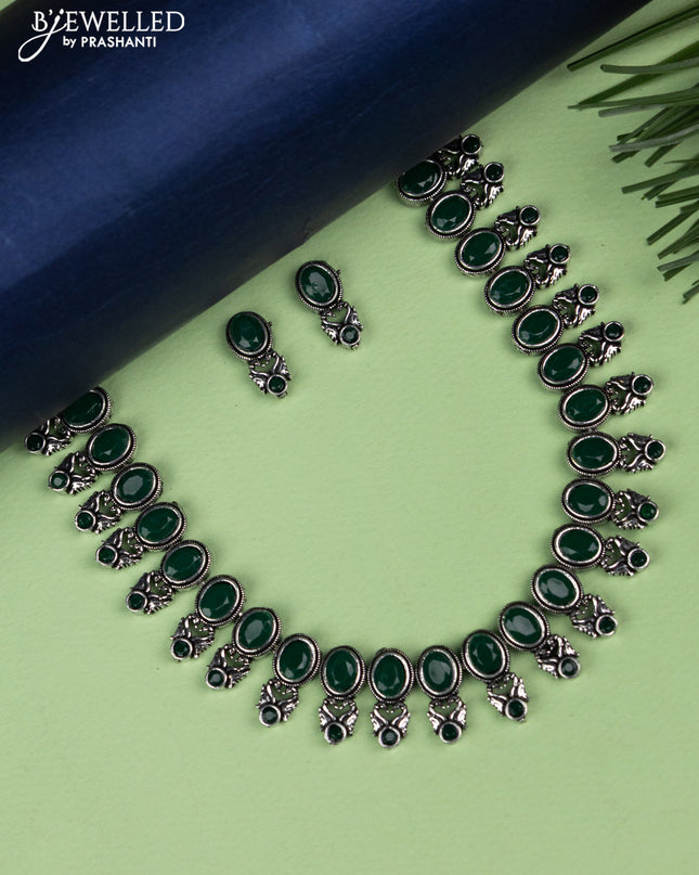 Oxidised necklace with emerald stones