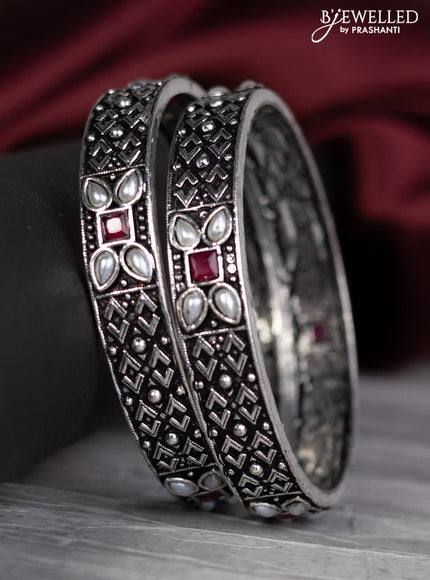 Oxidised bangle with ruby stones and pearl