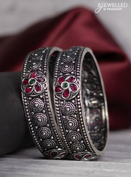 Oxidised bangle with emerald and ruby stones