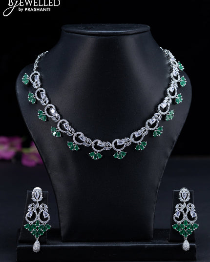 Zircon necklace floral design with emerald and cz stones