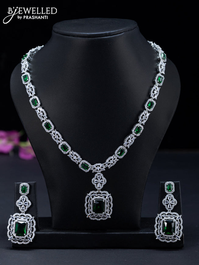 Zircon necklace floral design with emerald and cz stones