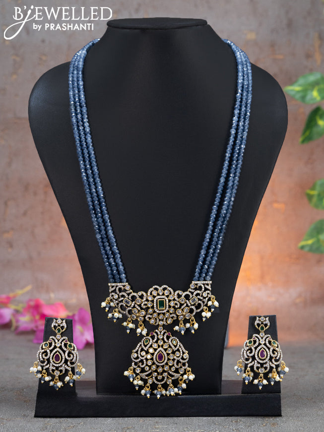 Beaded triple layer grey necklace with kemp & cz stones and beads hanging in victorian finish