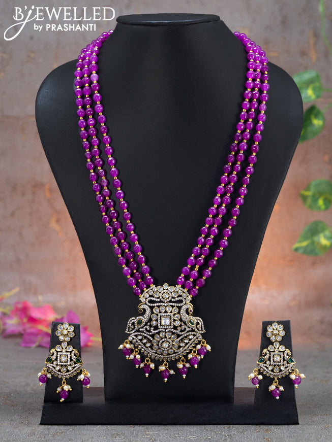 Beaded triple layer purple necklace peacock design with emerald & cz stones and beads hanging in victorian finish