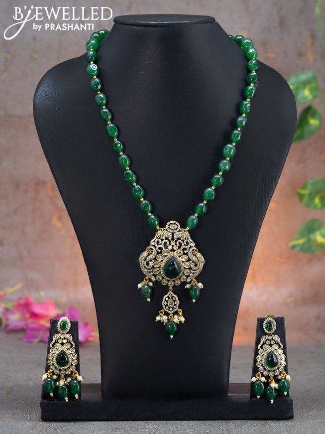 Beaded green necklace peacock design with emerald & cz stones and beads hanging in victorian finish