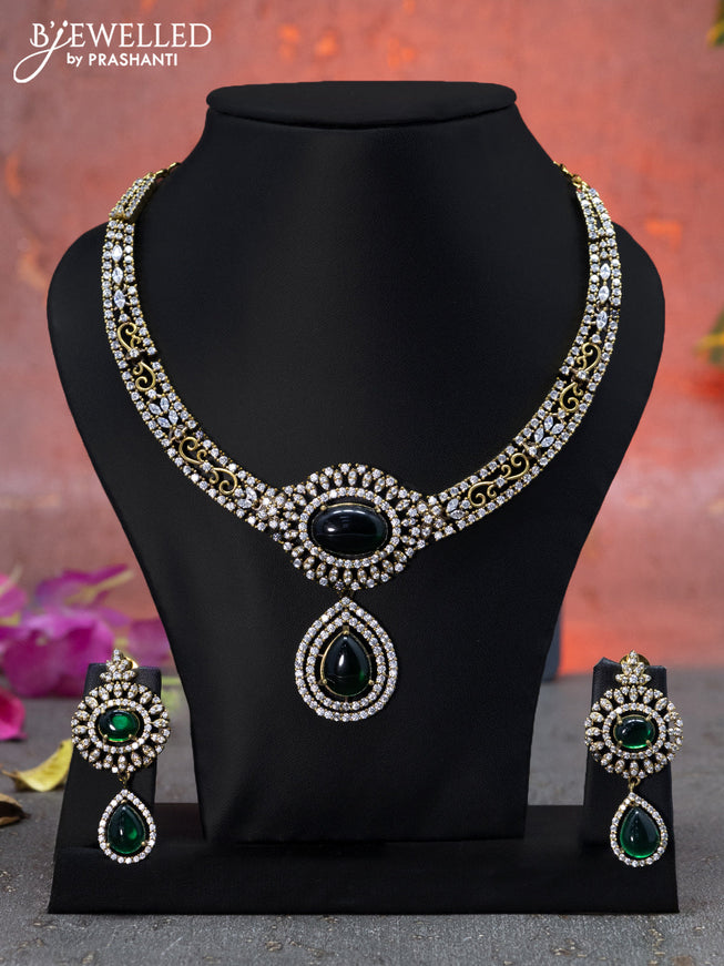 Necklace with emerald & cz stones and hangings in victorian finish