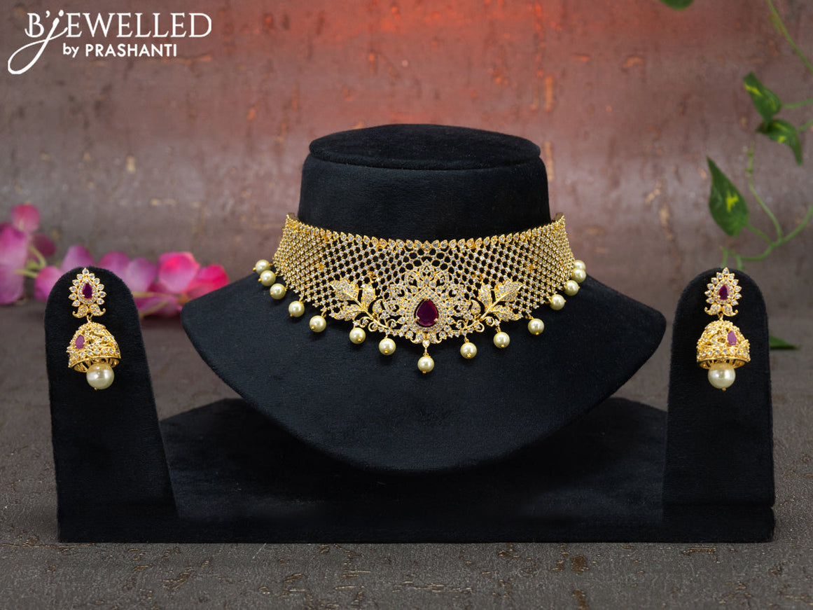 Zircon choker with ruby & cz stones and pearl hangings in gold finish