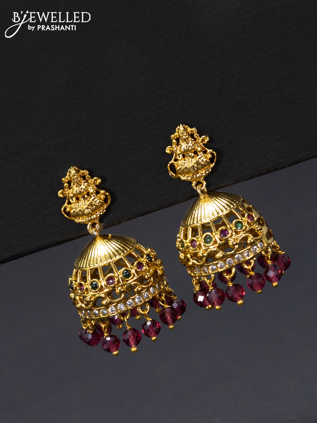 Antique jhumka lakshmi design with kemp & cz stones and pink beads hangings