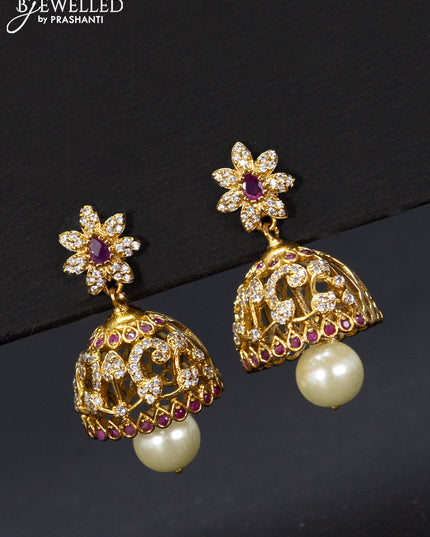 Antique jhumka floral design with pink kemp & cz stones and pearl hangings