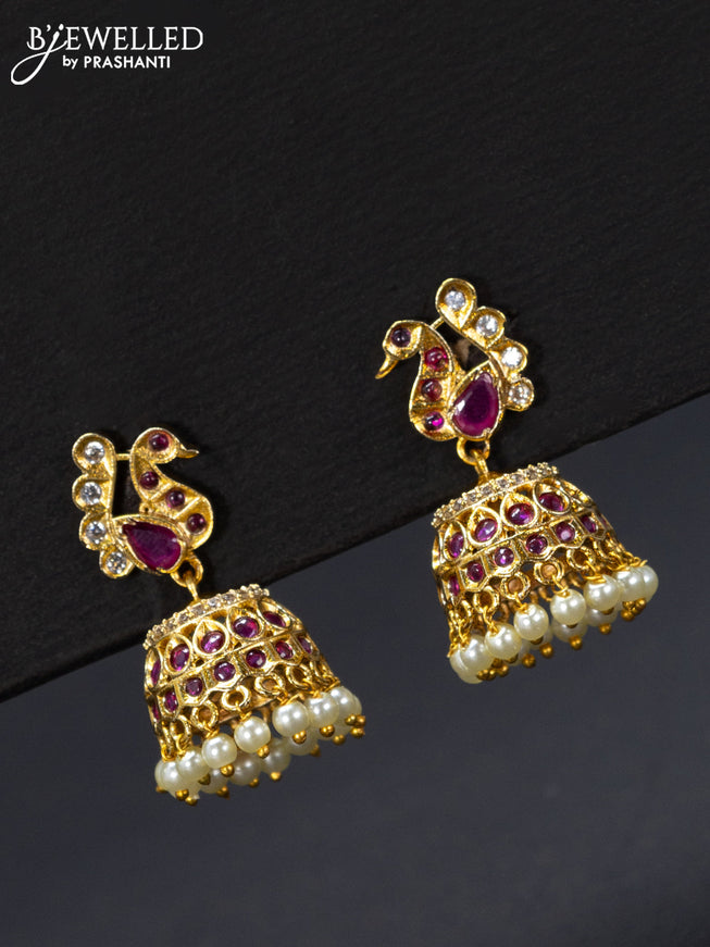 Antique jhumka peacock design with pink kemp & cz stones and pearl hangings